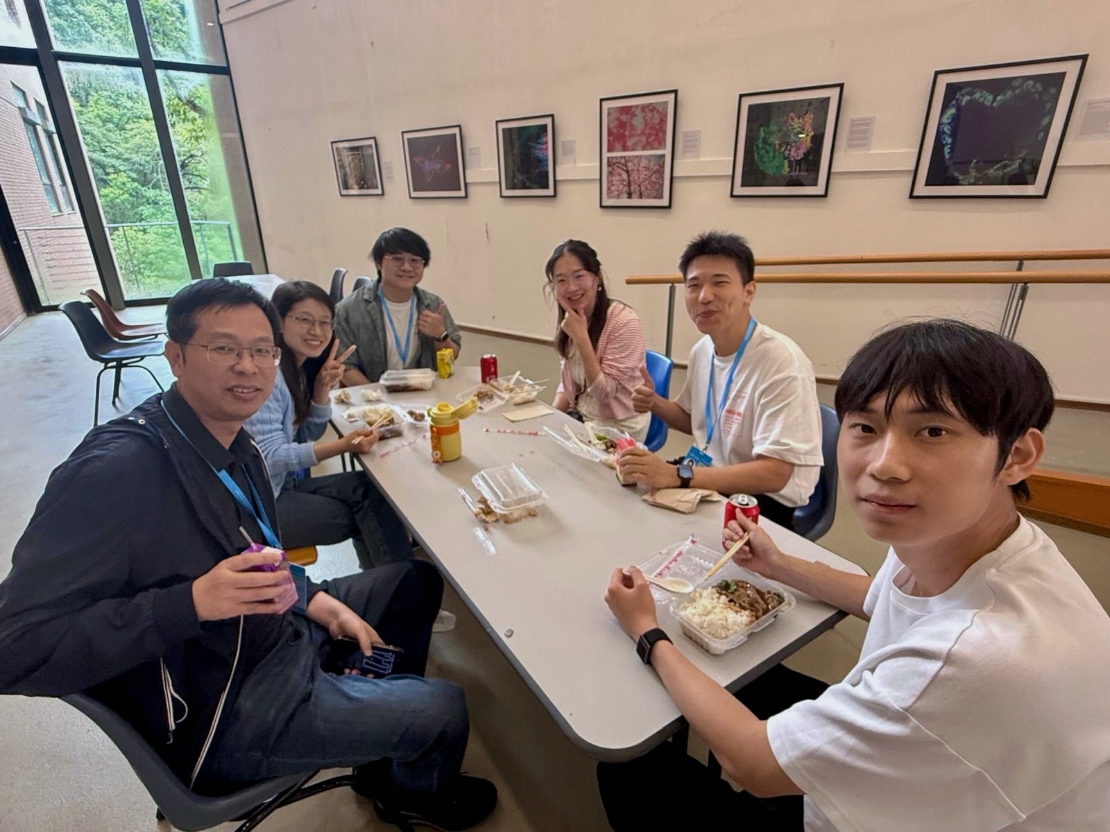 Participants gathering over lunch during the workshop